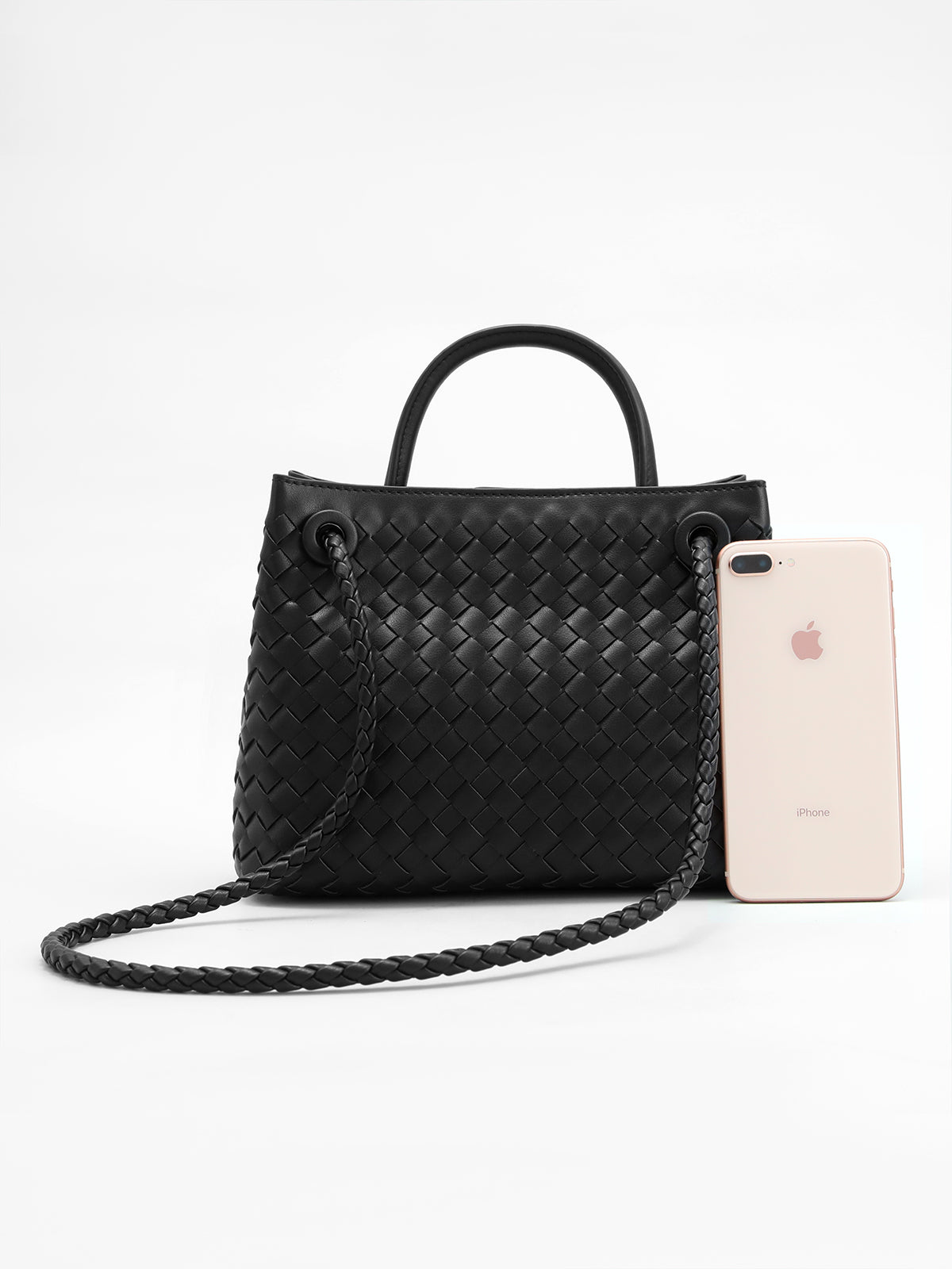 Bag with metal twisted detail handle