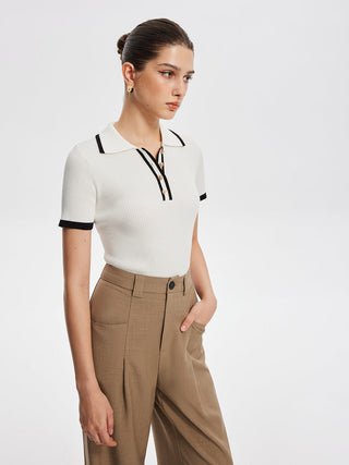 Top met knopen en polokraag