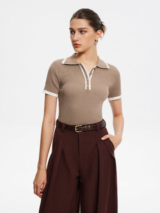 Top met knopen en polokraag